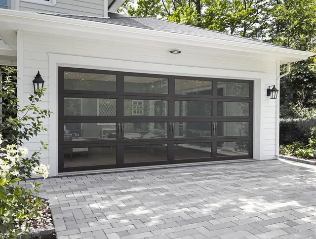 Granby Garage Door Repair design specialist presenting custom garage door options to Granby homeowner