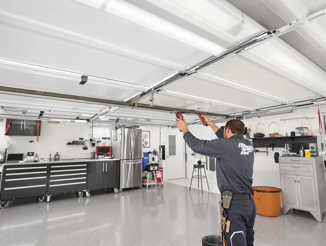 Overhead garage door repair service by Granby Garage Door Repair in Granby