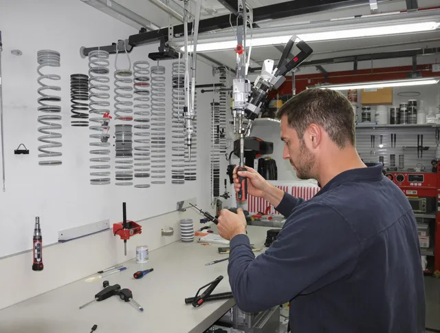 Granby Garage Door Repair safety certified technician performing precision spring replacement in Granby