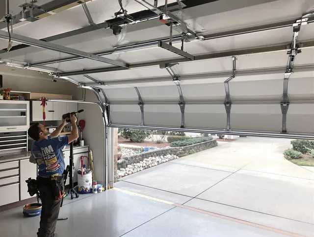 Garage door track repair service by Granby Garage Door Repair in Granby
